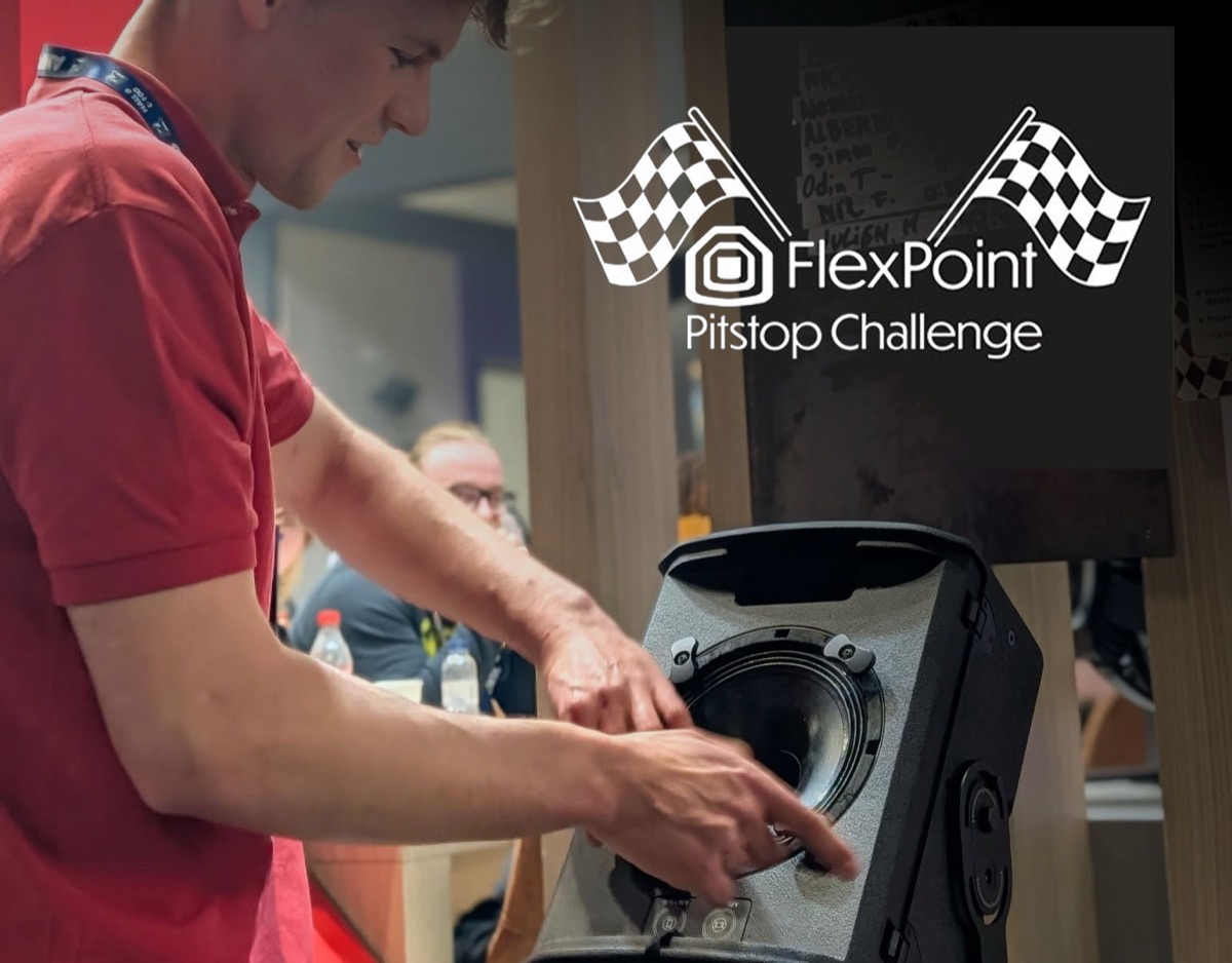 A visitor taking on the FlexPoint Pitstop Challenge on the Martin Audio stand at ISE